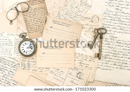 old letters and postcards, antique accessories. nostalgic sentimental background. ephemera
