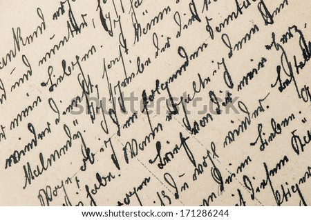 vintage handwriting with a text in undefined language. manuscript. parchment. grunge paper background