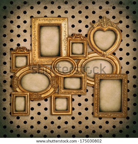 golden frame over grungy wallpaper background. empty baroque framework with canvas for photo and picture