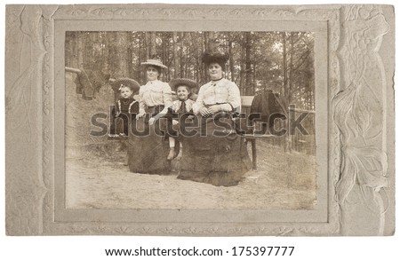 GERMANY, BERLIN- CIRCA 1912: antique family portrait of mother and daughter, vintage picture with film grain