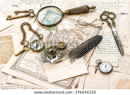 antique office accessories, old handwritten mails and vintage ink pen