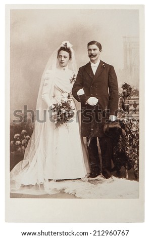 BERLIN, GERMANY - CIRCA 1890: antique wedding photo. portrait of just married couple. nostalgic picture with original scratches and film grain