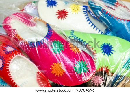 Colorful Moroccan kids silppers at the shoe shop