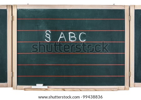 The letters ABC and the law sign written on a blackboard