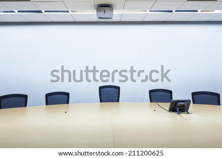 big table and chairs in business meeting room