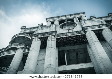 abandoned building can use horror movie scene background, low angle shot