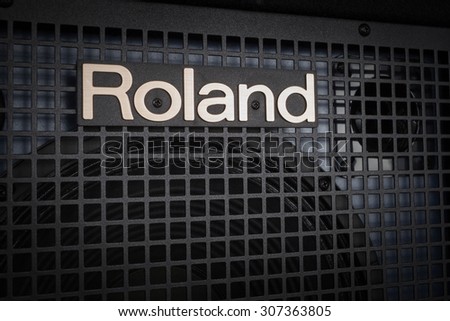 BANGKOK, THAILAND - AUGUST 6 : Roland Logo on Keyboard Power Amplifier as vintage background music theme, Bangkok, Thailand on 6 August 2015