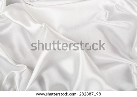 wavy white satin fabric for background use, full frame