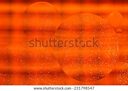 Abstract background of the oil droplets on the water.
