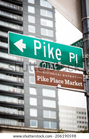 Pike Place Market street sign at the famous marketplace, Seattle's first farmer's market and home to the original Starbucks coffee shop.