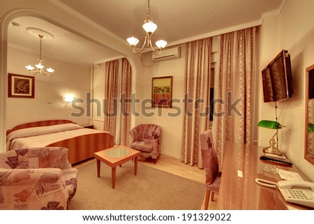 Belgrade, Serbia - Decembre 10, 2012: The interior of a luxurious hotel room, with king bed.