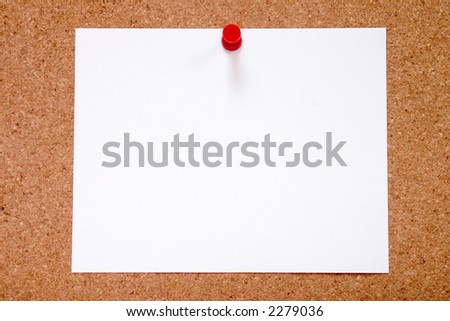 Blank paper stuck to a notice board, ready for your message.