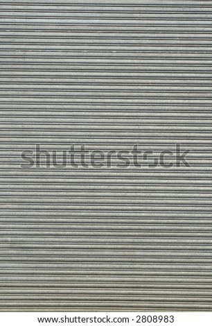 Vertical view of large warehouse door security shutters.