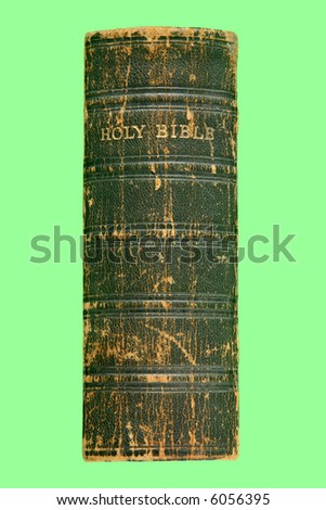 The spine of an old Victorian bible printed in 1868 on a green background.