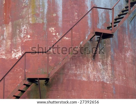 red stairs on the side of the building
