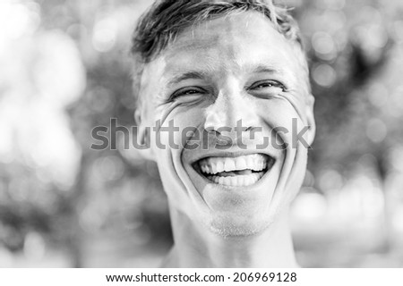 Happy man smiling, portrait.  Black and white images