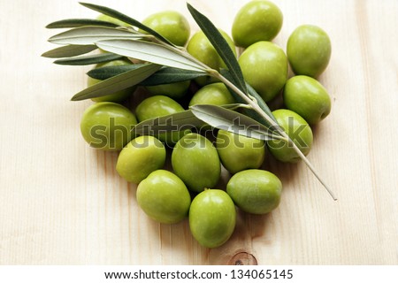 Olive branch and olive green in the shape of heart