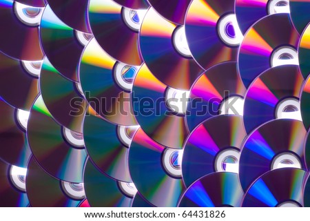 Set of DVD and CD discs as texture or wallpaper