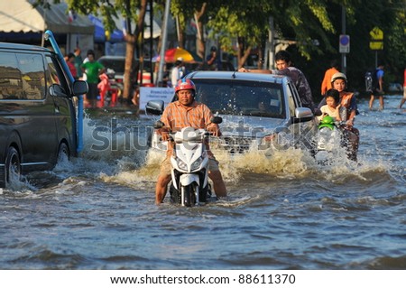 BANGKOK, THAILAND -NOVEMBER 9: Heavy flooding from monsoon rain in Ayutthaya and north Thailand arriving in Bangkok on NOVEMBER 9, 2011 in Bangkok, Thailand.