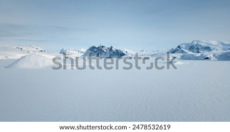 Similar – Image, Stock Photo snow covered landscape with country road, small deciduous trees on the left and higher conifers on the right of the road in sunshine / winter