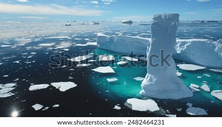 Similar – Image, Stock Photo View of the polar town of Tromso in northern Norway and the snowy hills in the background at sunset. The landmark of this Paris of the North