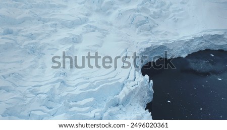 Similar – Foto Bild Massiver, mit Asche bedeckter Gletscher in vulkanischem Bergland