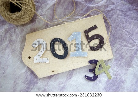 number of new year 2015 on wooden board