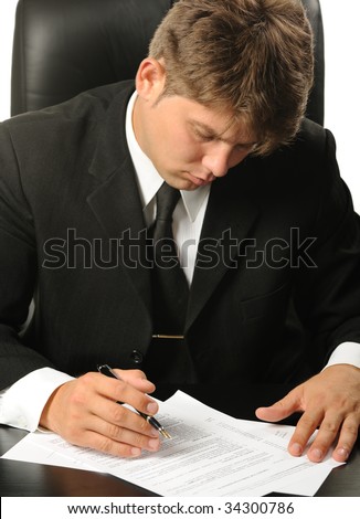 The businessman the studying contract before the signature
