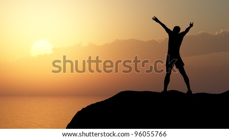 men greeting sun. Stands on hill, ocean and yellow sunset