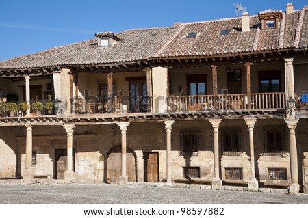 Traditional stone houses at the Plaza Mayor (Main Square) of Pedraza village, Segovia, Spain
