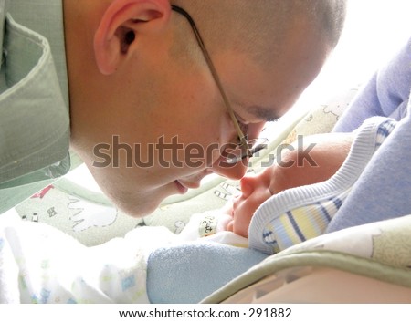 A father soldier meets his newborn son for the first time at 5 days of life.