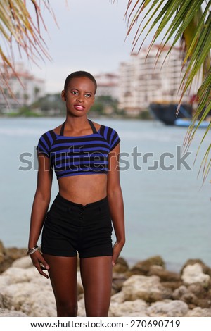 Woman posing in a tropical Miami setting