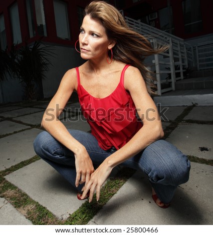 Beautiful woman squatting