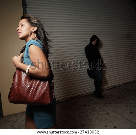 Woman Being Stalked By A Thug In The Dark Stock Photo 27413032 ...