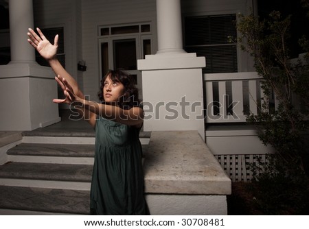 Woman with arms extended forward