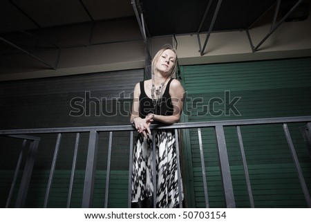 Woman leaning on the rail