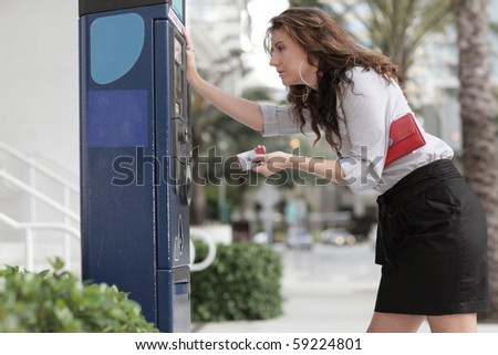 Woman paying for parking