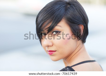 Woman looking over her shoulder