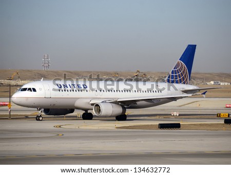 CHICAGO - MARCH 28: United Airlines Airbus A-320 jet arrives in Chicago after a cross country flight on March 28, 2013. United uses Chicago as its major hub.