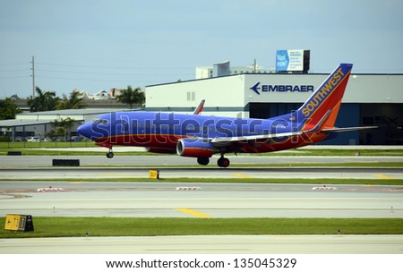 FORT LAUDERDALE - JUNE 4: Southwest Airlines Boeing 737 passenger jet arrives in Fort Lauderdale, FL on June 4, 2012. Southwest is the largest domestic carrier and caters mainly to leisure travelers