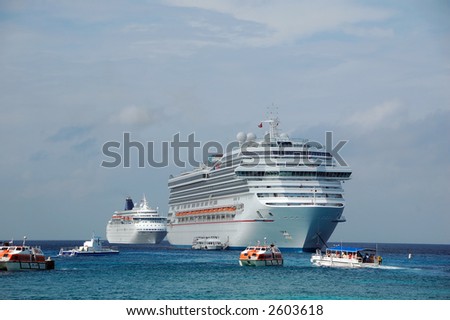 Two cruise ships ferrying passengers