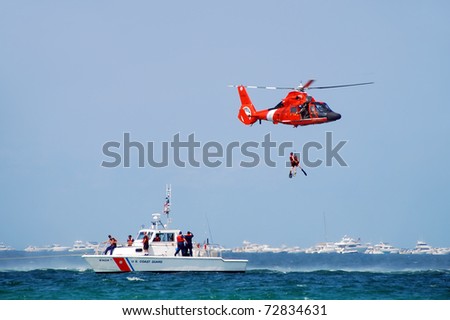 FORT LAUDERDALE, FLORIDA - MAY 7: US Coast Guard helicopter & cutter demonstrate a sea rescue as part of the 2007 Fort Lauderdale Air and Sea Show on May 7,2007 in Fort Lauderdale, Florida.