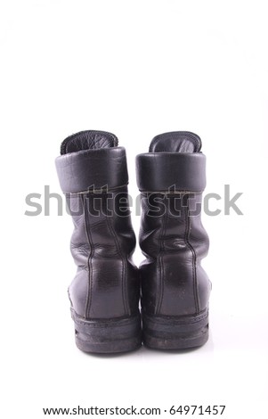 worn black army boot isolated on white
