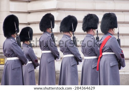 London, UK - March 17, Buckingham Palace, Changing of the guard at Buckingham Palace, Parade in winter gray uniform. March 17.2015 in London