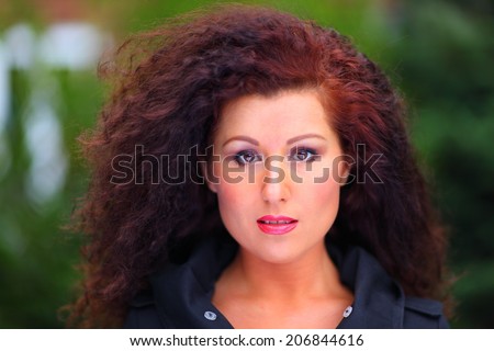 Beautiful woman with great skin and blurry background
