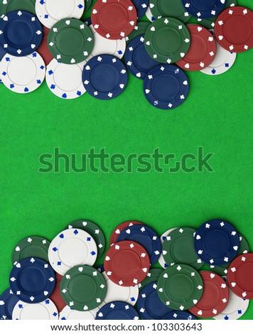 Poker chips on a green table background with room for your text
