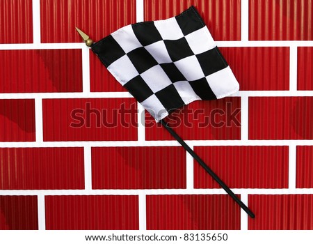 Rippled Wavy Black and White Finish Line Checkered Flag on brick wall background