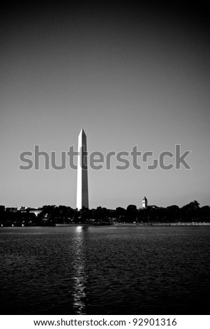 The pinnacle of the Washington Monument reaches into the sky above the District of Columbia.