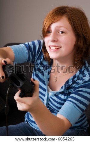 A middle school girl at home playing an exciting video game.