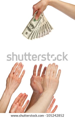 Many hands wanting to take money (bonus, salary or other payment); many hands reaching out for dollar banknotes isolated on white